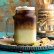 Dirty matcha latte in a jar.
