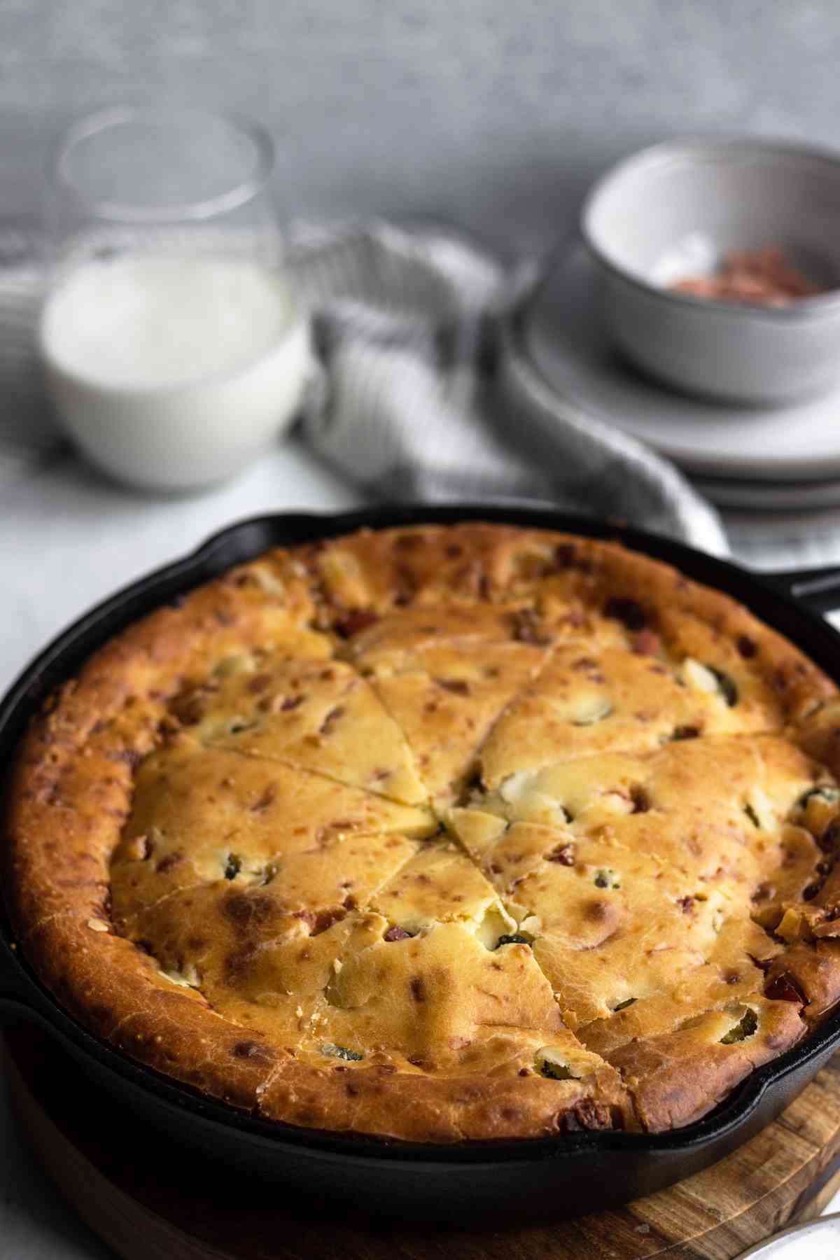 Ham and cheese quiche in a skillet.