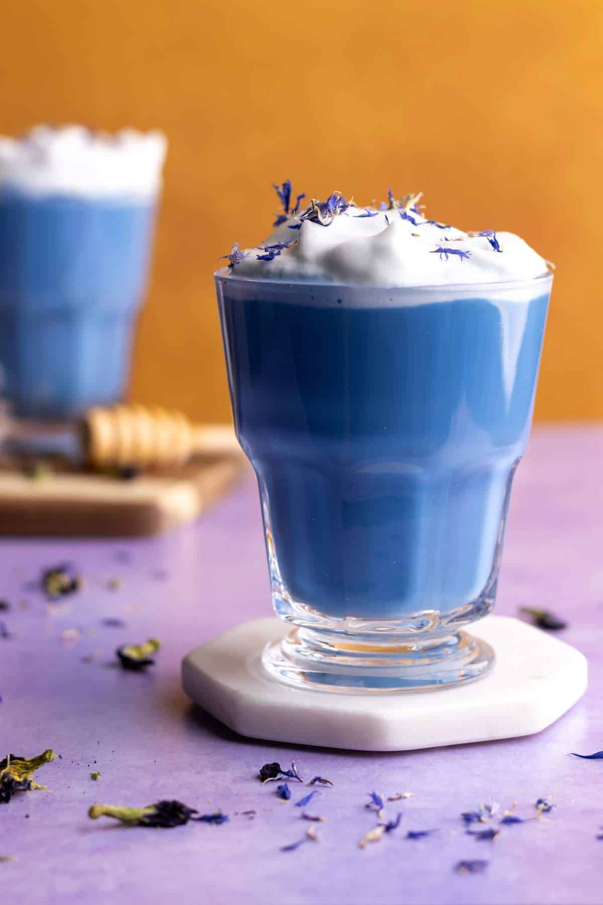 Butterfly pea latte with edible flowers.
