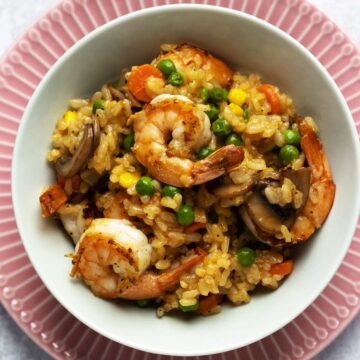 Cajun shrimp and rice pilaf in a bowl overhead.
