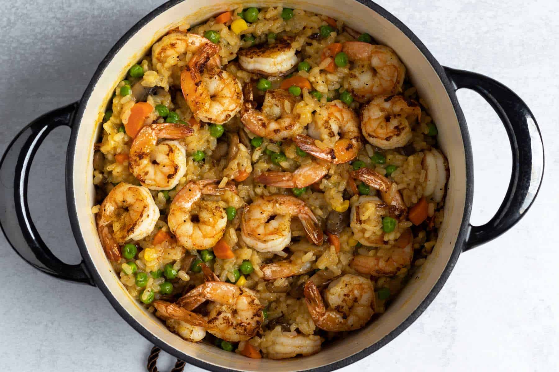 Cajun shrimp and rice pilaf in a dutch oven.