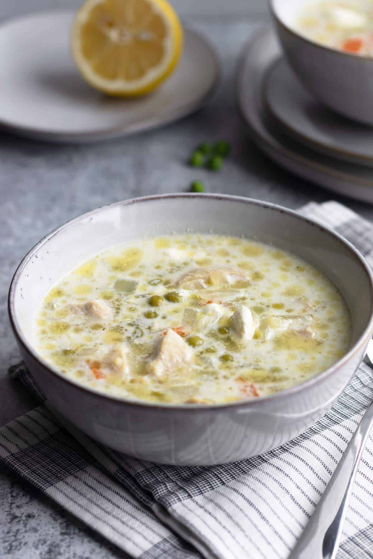 Chicken orzo soup in a bowl.