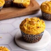 Cornbread muffin on a coaster.