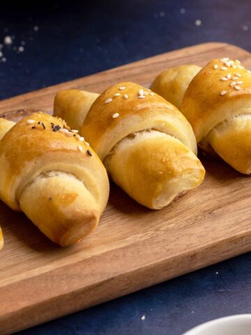 Easy yeast rolls on a small serving tray.