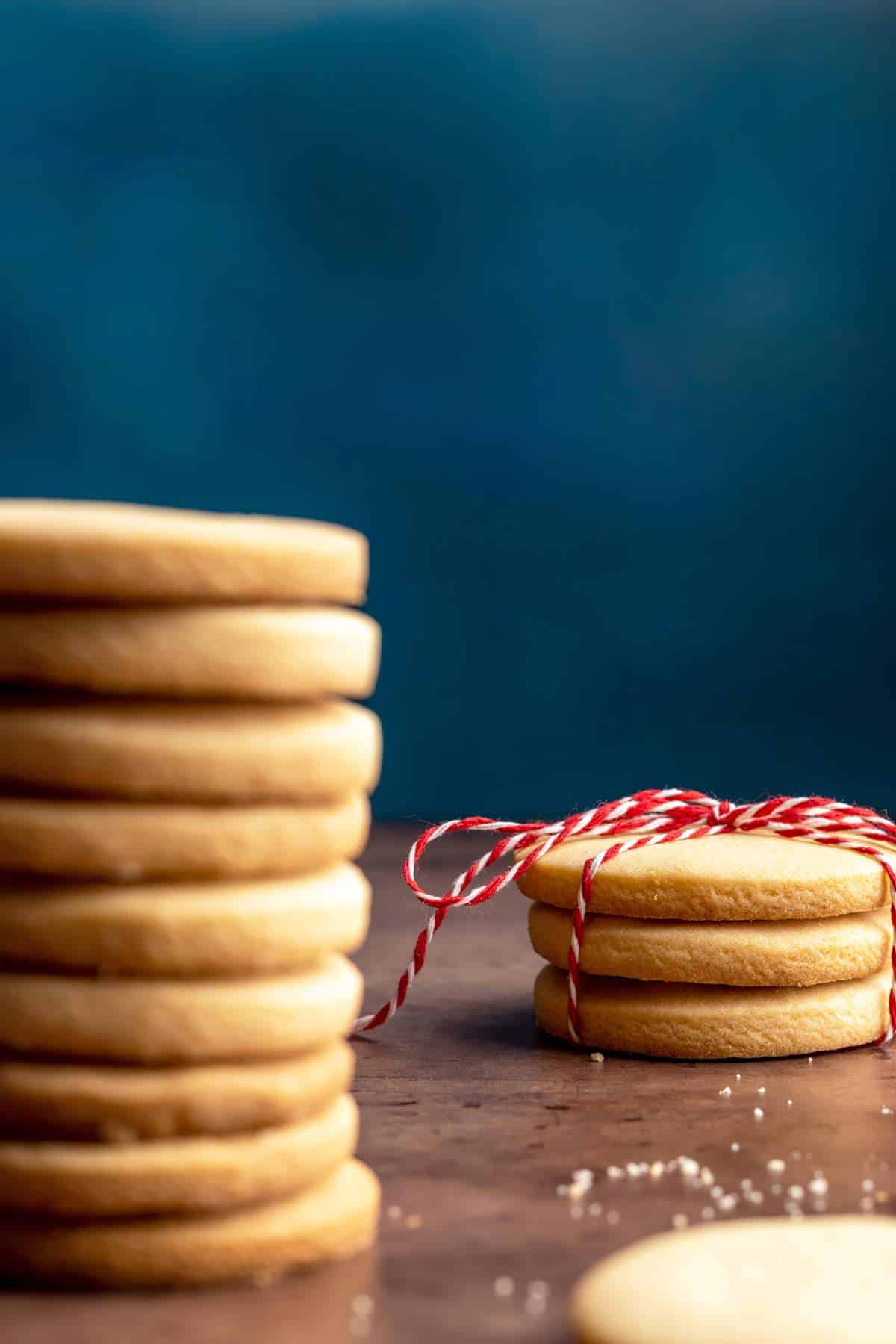 Gurabije lard cookies stacked and tied with a string.