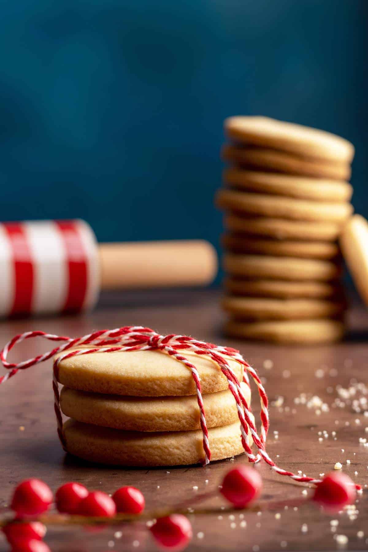 Gurabije lard cookies stacked and tied with a string.