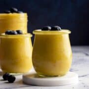 Mango apple smoothie in jars.