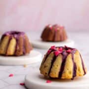 Mini bundt cake on a coaster.
