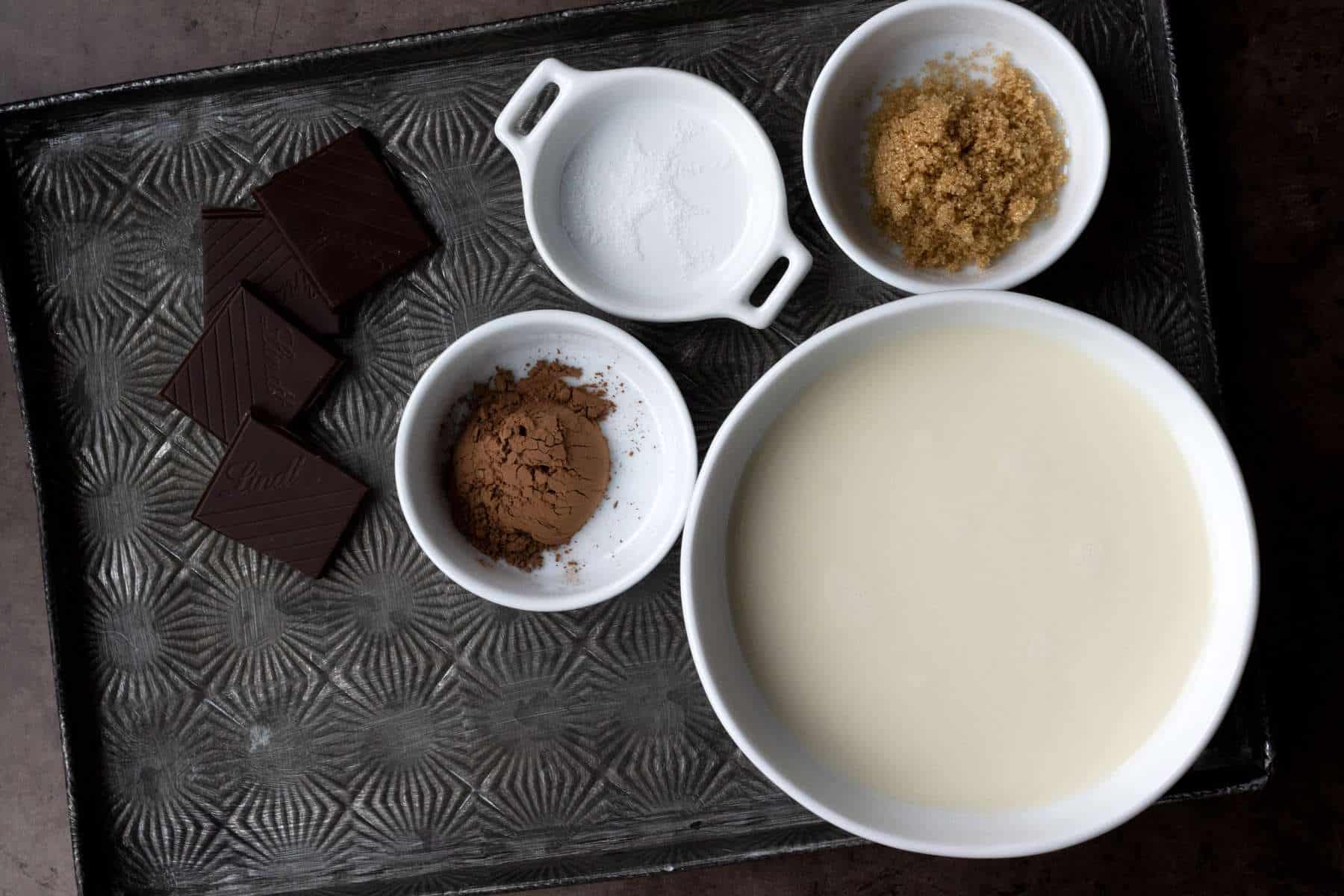 Hot chocolate ingredients on a tray.