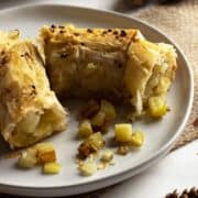 Phyllo potato pie on a small plate.