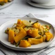 Roasted butternut squash on a plate.