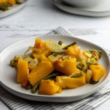 Roasted butternut squash on a plate.