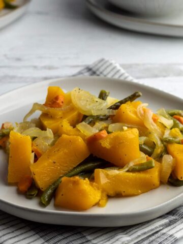 Roasted butternut squash on a plate.