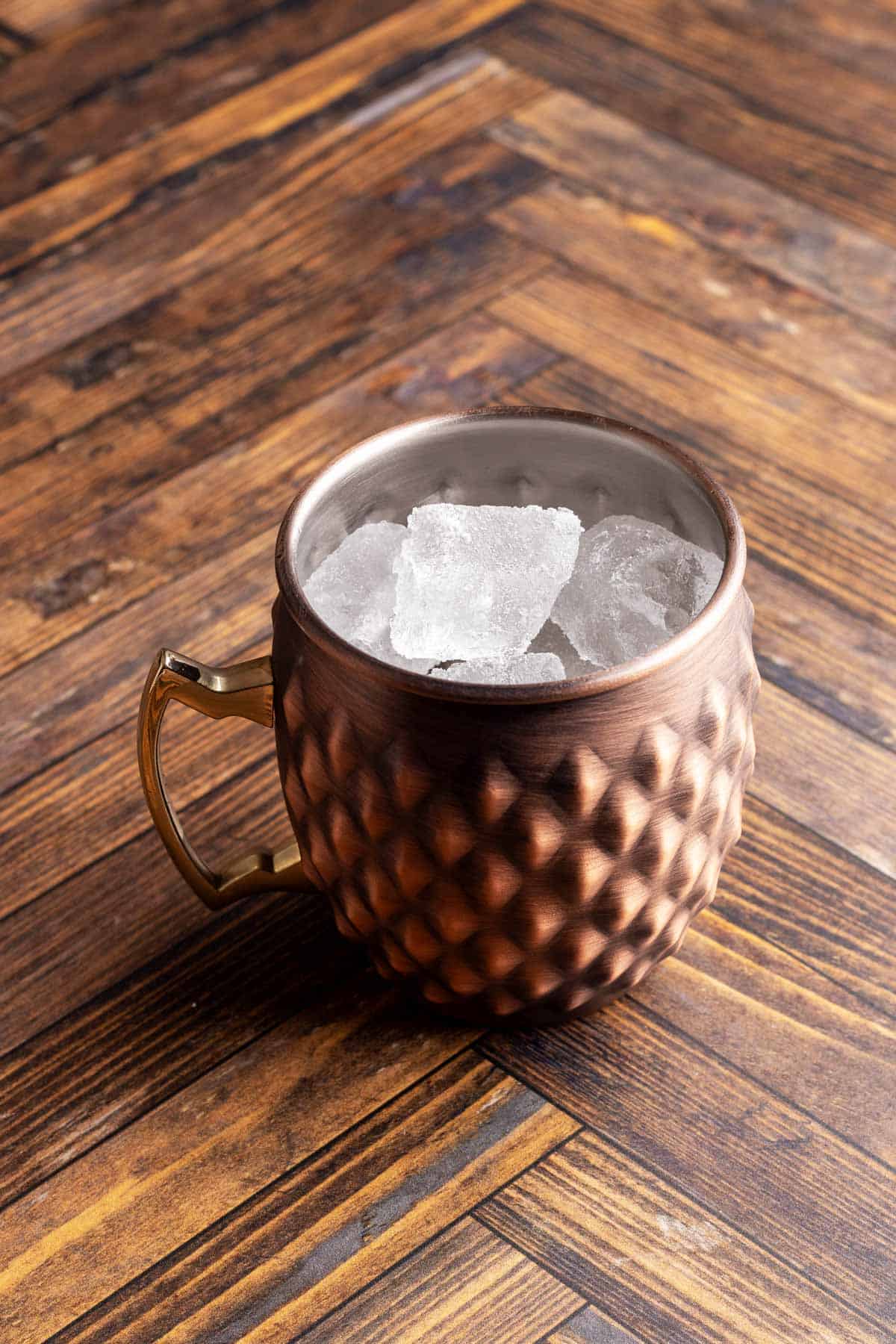 Copper mug filled with ice.