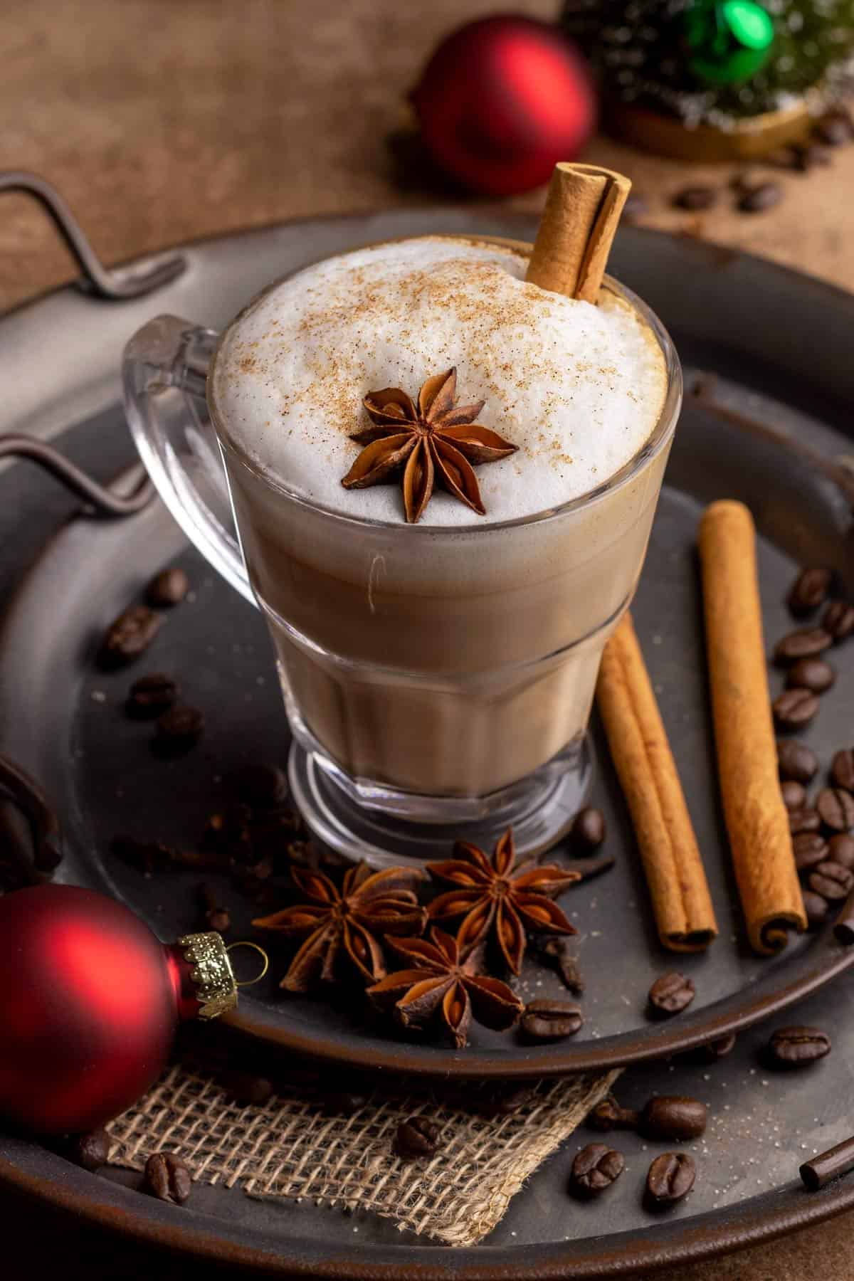 Dirty chai latte with cinnamon stick.