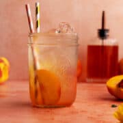 Refreshing peach lemonade in a jar.