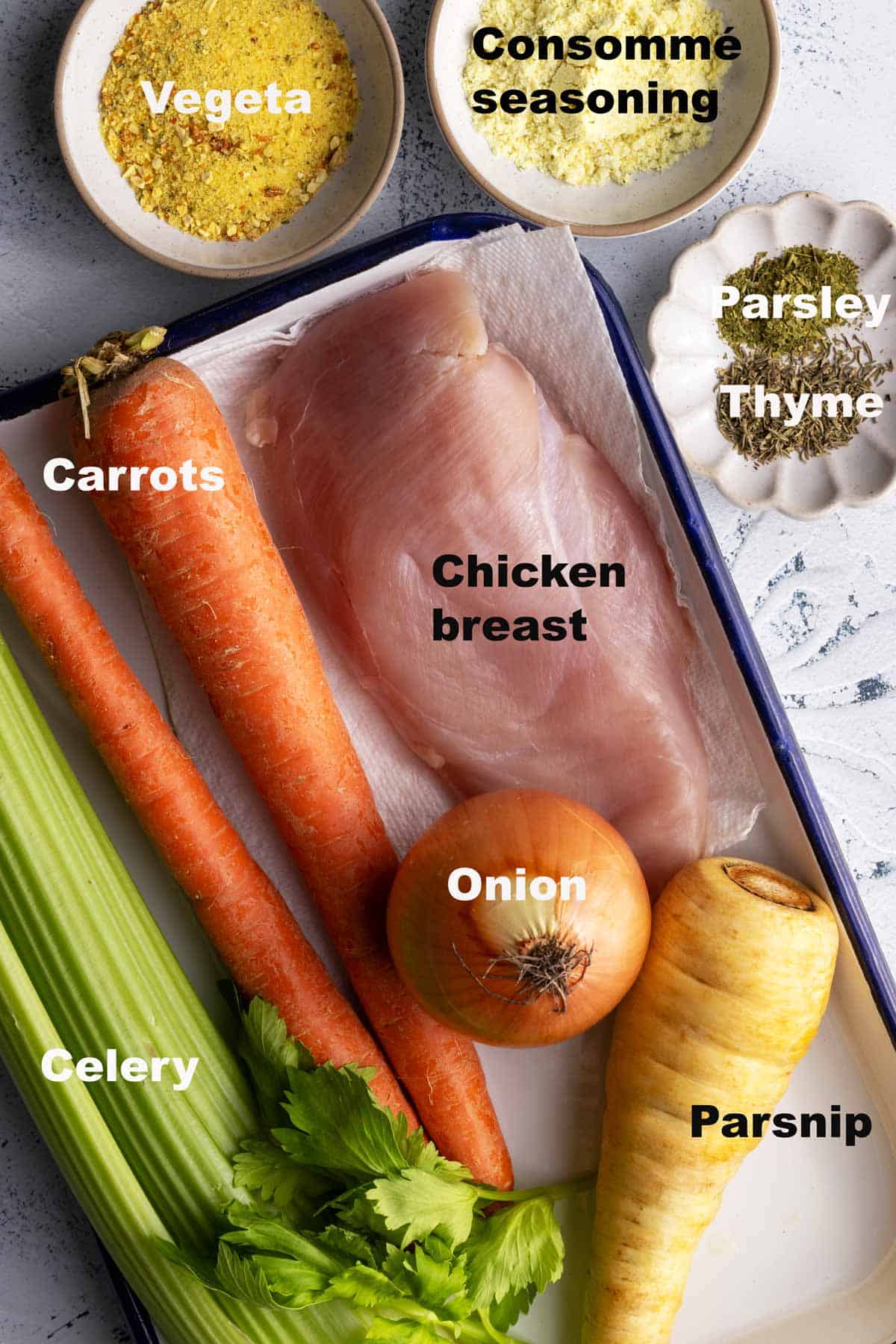Chicken soup ingredients on a plate.